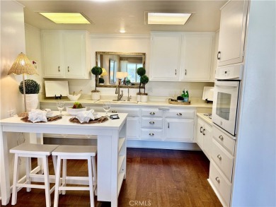 This elegant 2 bedroom one bathroom home is located in a serene on Leisure World Seal Beach Golf Course in California - for sale on GolfHomes.com, golf home, golf lot