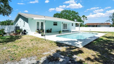 Sunshine, salty breezes, and that unmistakable St. Pete vibe -- on Mangrove Bay Golf Course in Florida - for sale on GolfHomes.com, golf home, golf lot