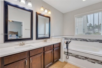 Welcome to the charm and lifestyle of Island West! This 4BR, 3BA on Island West Golf Club in South Carolina - for sale on GolfHomes.com, golf home, golf lot