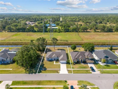 Stunning home in the beautiful WEDGEFIELD community, this on Wedgefield Golf Club in Florida - for sale on GolfHomes.com, golf home, golf lot
