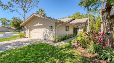 Lakefront villa that lives like a home, but without the hassle on The Meadows Golf and Country Club in Florida - for sale on GolfHomes.com, golf home, golf lot