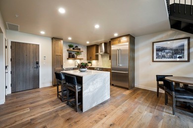 Experience elevated mountain living in this 2 bed, 2.5 bath, 1 on Osprey Meadows at Tamarack Resort in Idaho - for sale on GolfHomes.com, golf home, golf lot