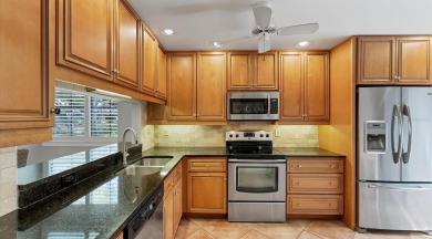Lakefront villa that lives like a home, but without the hassle on The Meadows Golf and Country Club in Florida - for sale on GolfHomes.com, golf home, golf lot