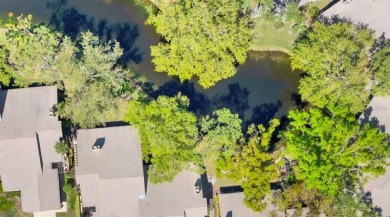 Lakefront villa that lives like a home, but without the hassle on The Meadows Golf and Country Club in Florida - for sale on GolfHomes.com, golf home, golf lot