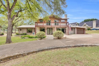 Well-maintained home located in the gated golf course community on De Cordova Bend Country Club in Texas - for sale on GolfHomes.com, golf home, golf lot