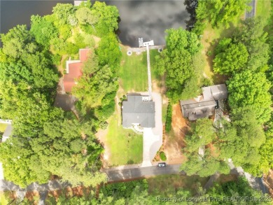 Are you looking for a gorgeous waterfront property? If so on Carolina Trace Country Club in North Carolina - for sale on GolfHomes.com, golf home, golf lot