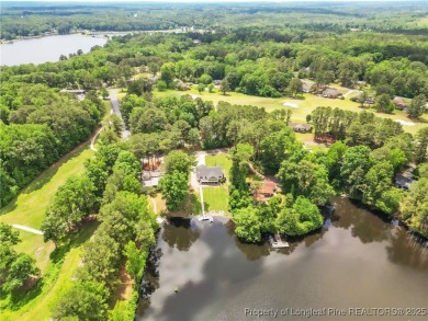 Are you looking for a gorgeous waterfront property? If so on Carolina Trace Country Club in North Carolina - for sale on GolfHomes.com, golf home, golf lot