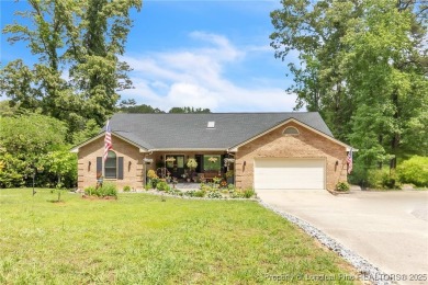 Are you looking for a gorgeous waterfront property? If so on Carolina Trace Country Club in North Carolina - for sale on GolfHomes.com, golf home, golf lot
