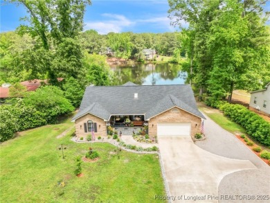Are you looking for a gorgeous waterfront property? If so on Carolina Trace Country Club in North Carolina - for sale on GolfHomes.com, golf home, golf lot