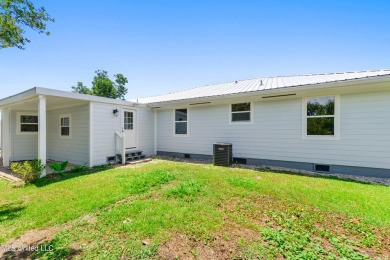 Gorgeously renovated, this 4-bedroom, 2.5-bathroom home is on The Bridges Golf Club At Hollywood Casino in Mississippi - for sale on GolfHomes.com, golf home, golf lot