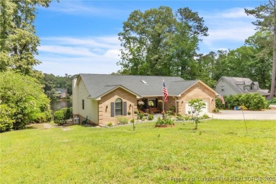Are you looking for a gorgeous waterfront property? If so on Carolina Trace Country Club in North Carolina - for sale on GolfHomes.com, golf home, golf lot