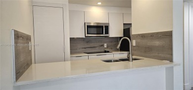 Welcome to this greatly remodeled 1 bedroom 1 bathroom condo on Country Club of Miami in Florida - for sale on GolfHomes.com, golf home, golf lot