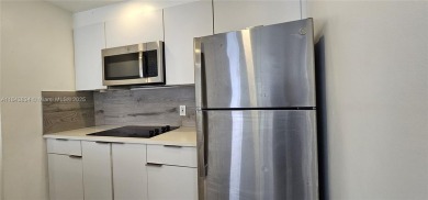 Welcome to this greatly remodeled 1 bedroom 1 bathroom condo on Country Club of Miami in Florida - for sale on GolfHomes.com, golf home, golf lot