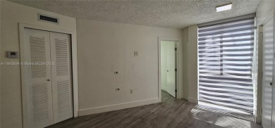 Welcome to this greatly remodeled 1 bedroom 1 bathroom condo on Country Club of Miami in Florida - for sale on GolfHomes.com, golf home, golf lot