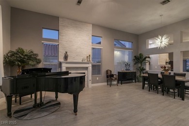 This beautifully reimagined residence offers unmatched views of on Highland Falls Golf Club in Nevada - for sale on GolfHomes.com, golf home, golf lot