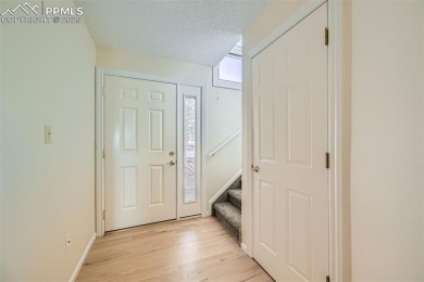 Welcome home to this freshly remodeled (2024) two-story townhome on Country Club of Colorado in Colorado - for sale on GolfHomes.com, golf home, golf lot