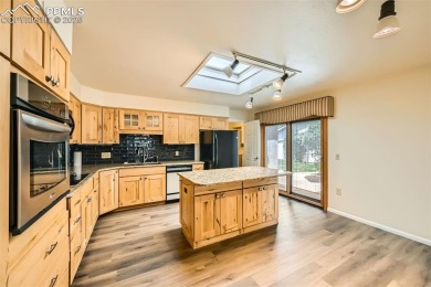Welcome home to this freshly remodeled (2024) two-story townhome on Country Club of Colorado in Colorado - for sale on GolfHomes.com, golf home, golf lot