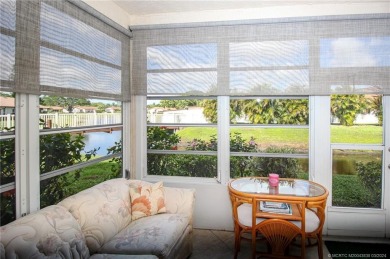 Inviting garden and lake views await in this charming ground on Mariner Sands Country Club in Florida - for sale on GolfHomes.com, golf home, golf lot