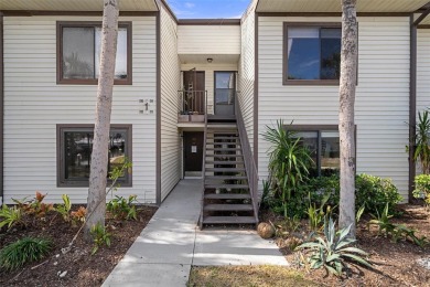 Embrace quintessential Florida waterfront living in this on Tarpon Springs Golf Course in Florida - for sale on GolfHomes.com, golf home, golf lot