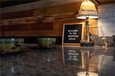 Welcome to this stunningly remodeled, fully furnished 4-bedroom on Seven Springs Mountain Resort in Pennsylvania - for sale on GolfHomes.com, golf home, golf lot