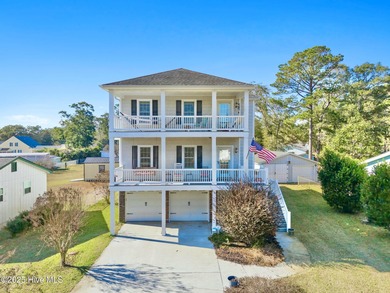 Designed for the best of coastal living! Impressive Sunset Beach on Sea Trail Golf Resort in North Carolina - for sale on GolfHomes.com, golf home, golf lot