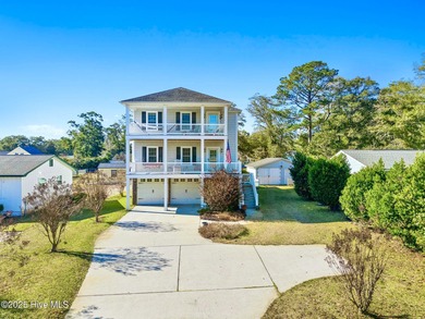 Designed for the best of coastal living! Impressive Sunset Beach on Sea Trail Golf Resort in North Carolina - for sale on GolfHomes.com, golf home, golf lot