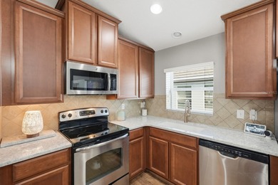 Step into pristine, easy-living perfection in Savona North with on Venetian Bay Golf Course in Florida - for sale on GolfHomes.com, golf home, golf lot