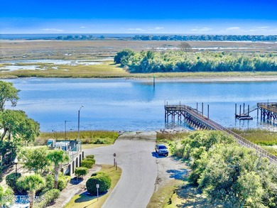 Designed for the best of coastal living! Impressive Sunset Beach on Sea Trail Golf Resort in North Carolina - for sale on GolfHomes.com, golf home, golf lot