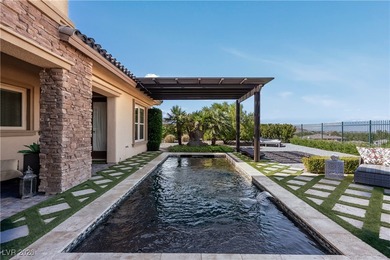 Located in the exclusive guard-gated Southern Highlands Golf on Southern Highlands Golf Club in Nevada - for sale on GolfHomes.com, golf home, golf lot