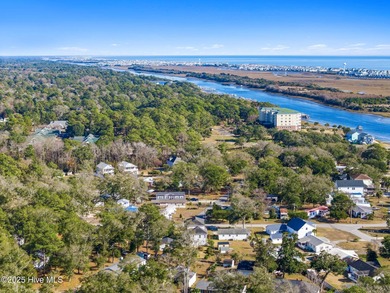 Designed for the best of coastal living! Impressive Sunset Beach on Sea Trail Golf Resort in North Carolina - for sale on GolfHomes.com, golf home, golf lot
