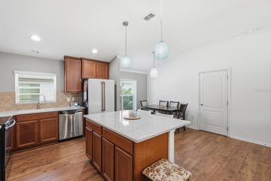 Step into pristine, easy-living perfection in Savona North with on Venetian Bay Golf Course in Florida - for sale on GolfHomes.com, golf home, golf lot