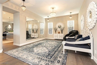 Located in the exclusive guard-gated Southern Highlands Golf on Southern Highlands Golf Club in Nevada - for sale on GolfHomes.com, golf home, golf lot