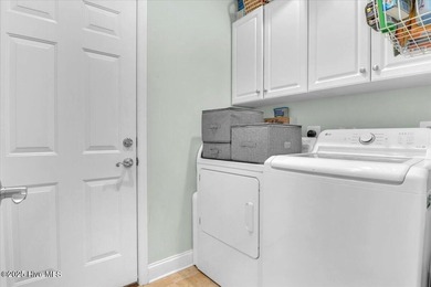 Welcome to this inviting 3-bedroom, 2-bath home in Lockwood on Lockwood Folly Country Club in North Carolina - for sale on GolfHomes.com, golf home, golf lot