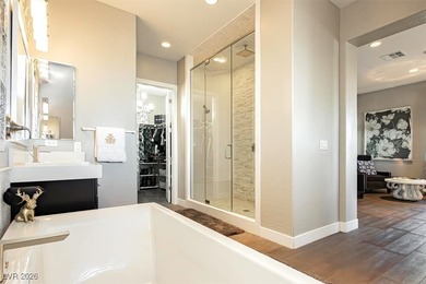 Located in the exclusive guard-gated Southern Highlands Golf on Southern Highlands Golf Club in Nevada - for sale on GolfHomes.com, golf home, golf lot