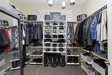 Located in the exclusive guard-gated Southern Highlands Golf on Southern Highlands Golf Club in Nevada - for sale on GolfHomes.com, golf home, golf lot