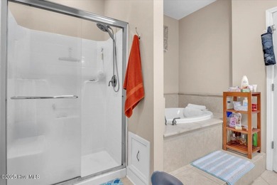 Welcome to this inviting 3-bedroom, 2-bath home in Lockwood on Lockwood Folly Country Club in North Carolina - for sale on GolfHomes.com, golf home, golf lot