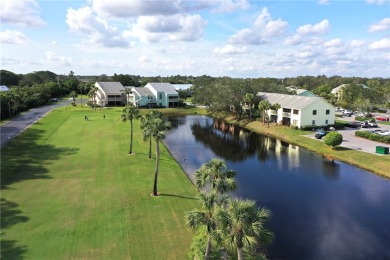 Welcome to Pelican Point! Featuring 2/2 , corner unit with Lake on Pelican Pointe 9 Hole Course in Florida - for sale on GolfHomes.com, golf home, golf lot