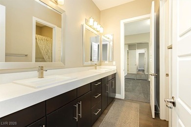 Located in the exclusive guard-gated Southern Highlands Golf on Southern Highlands Golf Club in Nevada - for sale on GolfHomes.com, golf home, golf lot