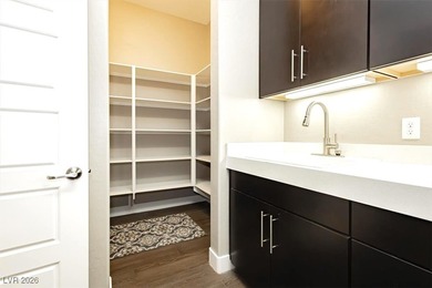 Located in the exclusive guard-gated Southern Highlands Golf on Southern Highlands Golf Club in Nevada - for sale on GolfHomes.com, golf home, golf lot