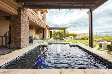 Located in the exclusive guard-gated Southern Highlands Golf on Southern Highlands Golf Club in Nevada - for sale on GolfHomes.com, golf home, golf lot