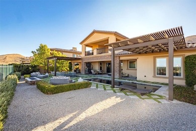 Located in the exclusive guard-gated Southern Highlands Golf on Southern Highlands Golf Club in Nevada - for sale on GolfHomes.com, golf home, golf lot