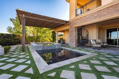 Located in the exclusive guard-gated Southern Highlands Golf on Southern Highlands Golf Club in Nevada - for sale on GolfHomes.com, golf home, golf lot