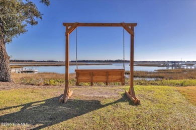 Welcome to this inviting 3-bedroom, 2-bath home in Lockwood on Lockwood Folly Country Club in North Carolina - for sale on GolfHomes.com, golf home, golf lot