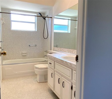 Spacious 1/1 condo featuring a kitchen with easy pass-through to on Lauderhill Golf Course in Florida - for sale on GolfHomes.com, golf home, golf lot