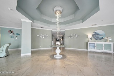 Experience luxury living in this beautiful two-bedroom on Oceans Golf Club in Florida - for sale on GolfHomes.com, golf home, golf lot