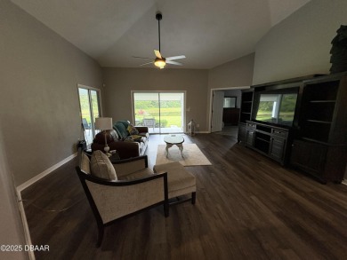 This Johnson-built block home is move in ready, located in the on Turnbull Bay Golf Club in Florida - for sale on GolfHomes.com, golf home, golf lot