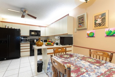 LOWER PRICE FOR 3/2 CONDO WITH GOLF. SUNNY FLORIDA OPPORTUNITY on Poinciana Golf Club in Florida - for sale on GolfHomes.com, golf home, golf lot