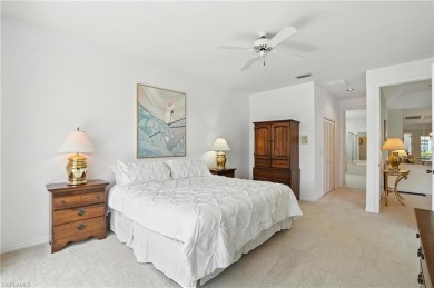This 2-bedroom plus den villa offers sweeping golf course views on Estero Country Club in Florida - for sale on GolfHomes.com, golf home, golf lot