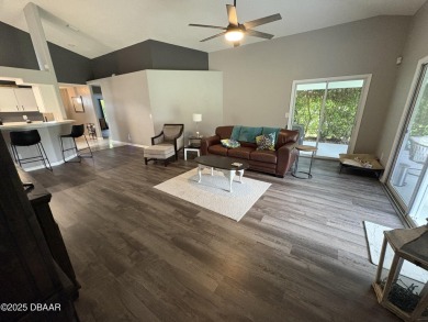 This Johnson-built block home is move in ready, located in the on Turnbull Bay Golf Club in Florida - for sale on GolfHomes.com, golf home, golf lot