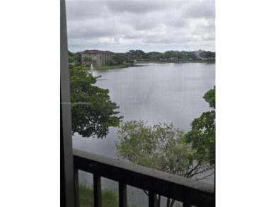 Top floor Penthouse corner Magnolia unit. On the lake in one of on Flamingo Lakes Country Club in Florida - for sale on GolfHomes.com, golf home, golf lot